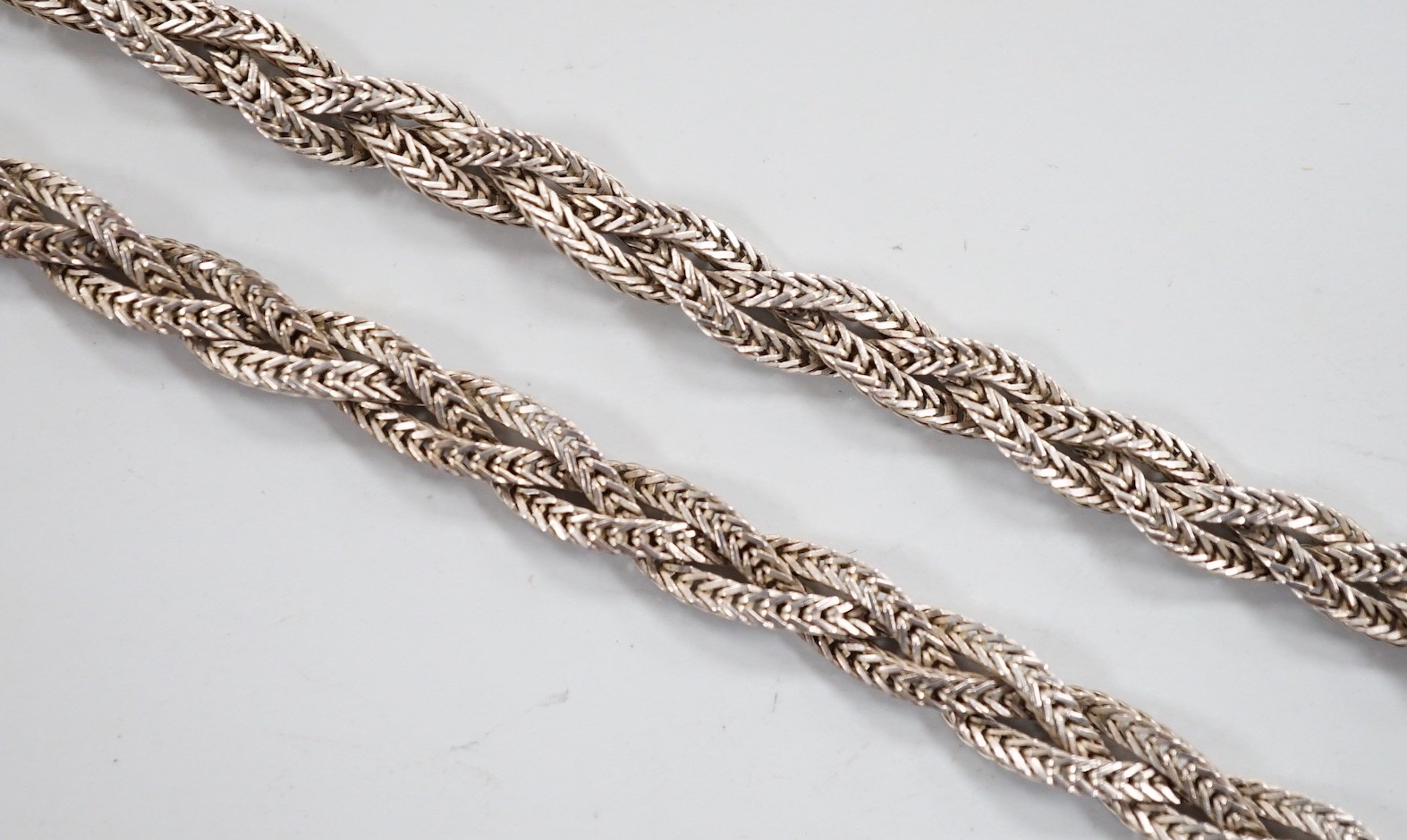 A cased modern interwoven silver necklace, 44cm.